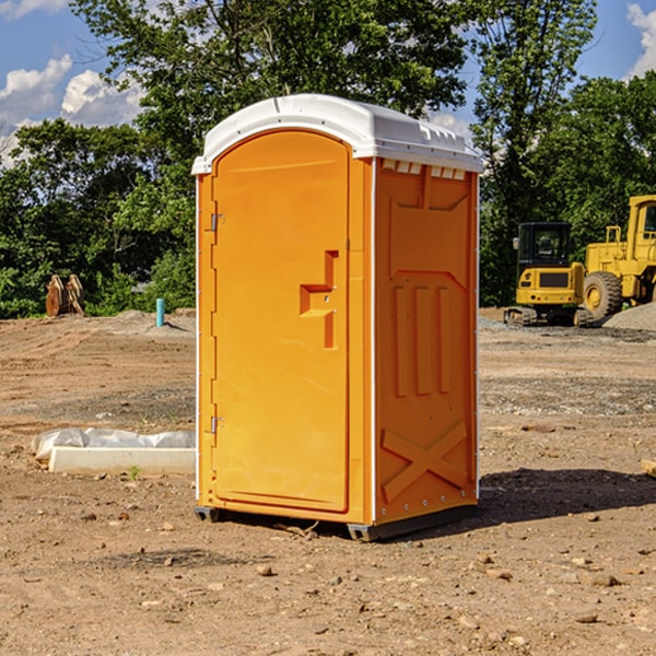 how often are the portable restrooms cleaned and serviced during a rental period in Dover MI